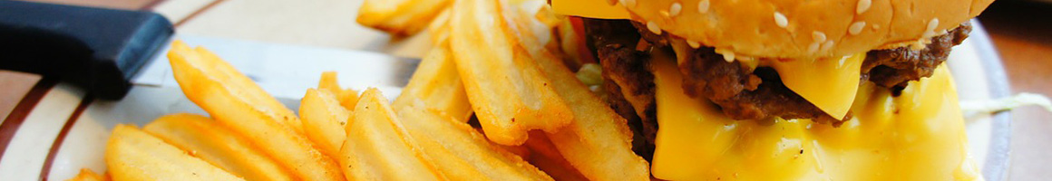 Eating American (Traditional) Burger at Mountain Good Restaurant restaurant in Boulder, MT.